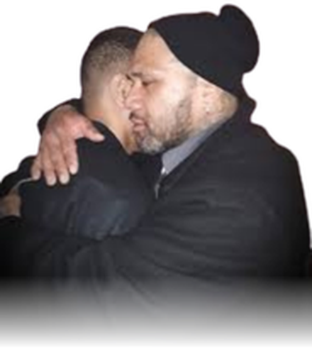 Johnny Toa Moa embracing his son Mosa'ati Moa
